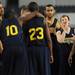 Michigan freshman Spike Albrecht jokes around with his teammates as they huddle during practice at Cowboys Stadium in Arlington, Texas on Thursday, March 28, 2013. Melanie Maxwell I AnnArbor.com